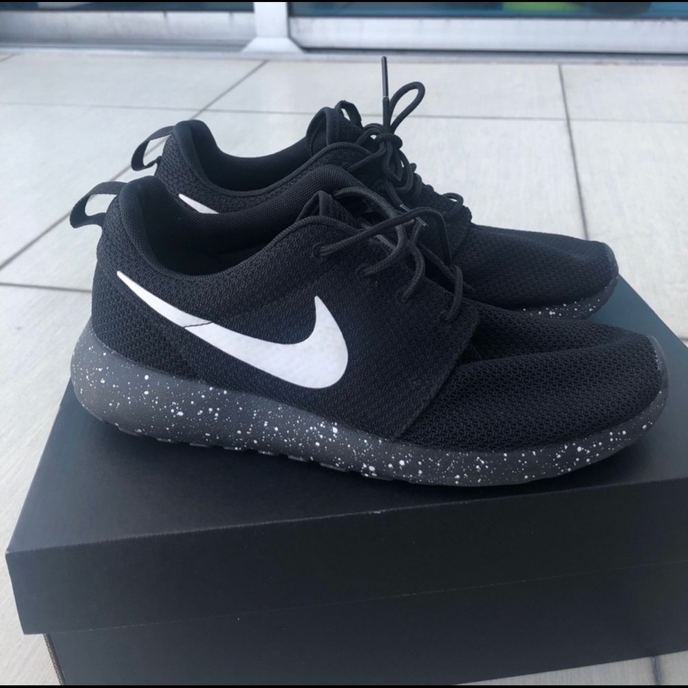 Black Nike running shoes